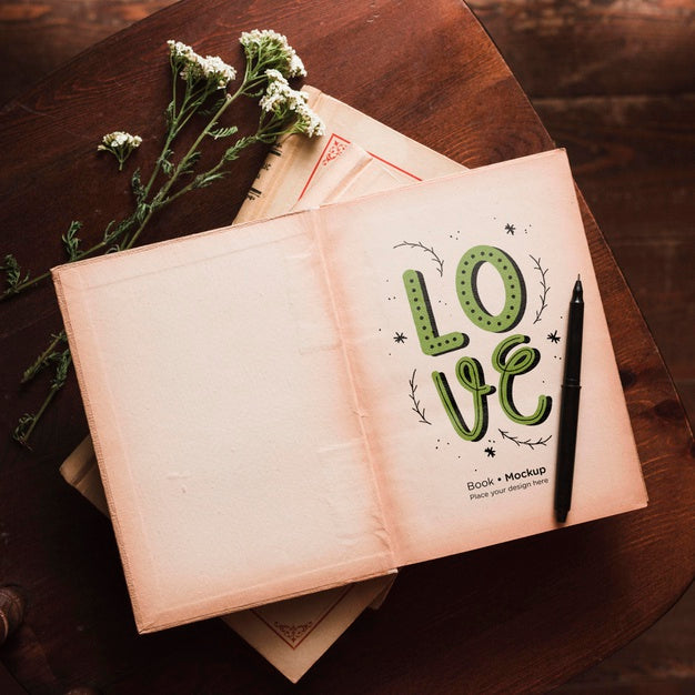Top View Of Books With Flowers And Pen Psd