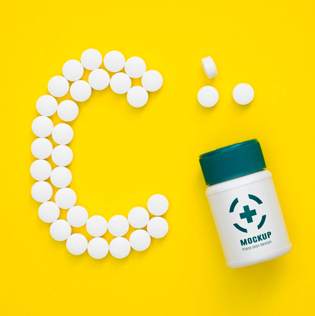 Top View Of Bottle With Pills In Shape Of C Psd