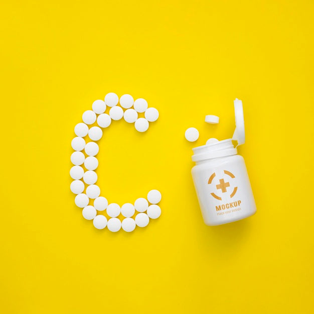 Top View Of Bottle With Pills In Shape Of C Psd