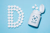 Top View Of Bottle With Pills In Shape Of D Psd
