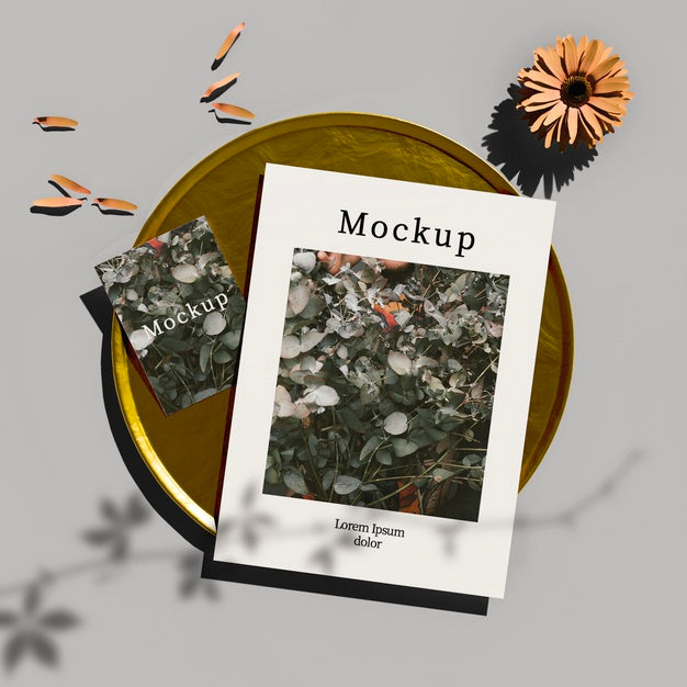 Top View Of Card On Golden Tray With Flower And Petals Psd