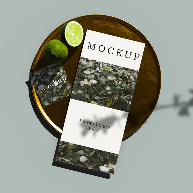 Top View Of Card On Golden Tray With Limes Psd