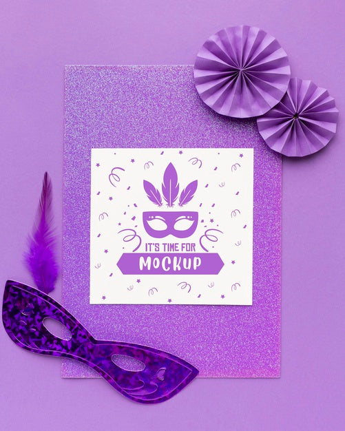 Top View Of Carnival Masks And Paper Rosettes Psd