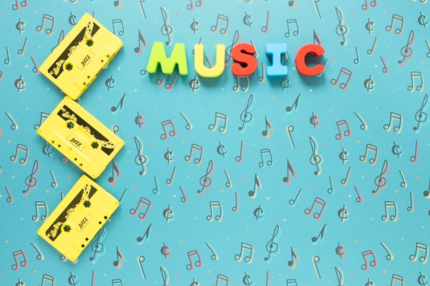 Top View Of Cassettes On Blue Background Psd