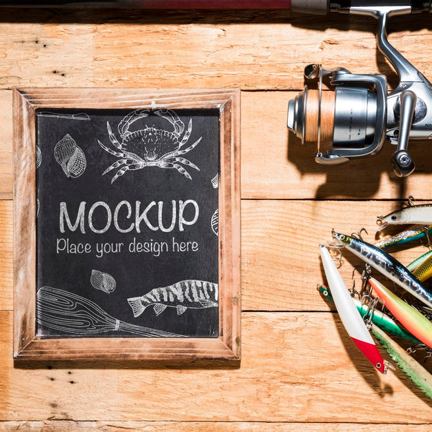 Top View Of Chalkboard With Fishing Rod And Bait Psd