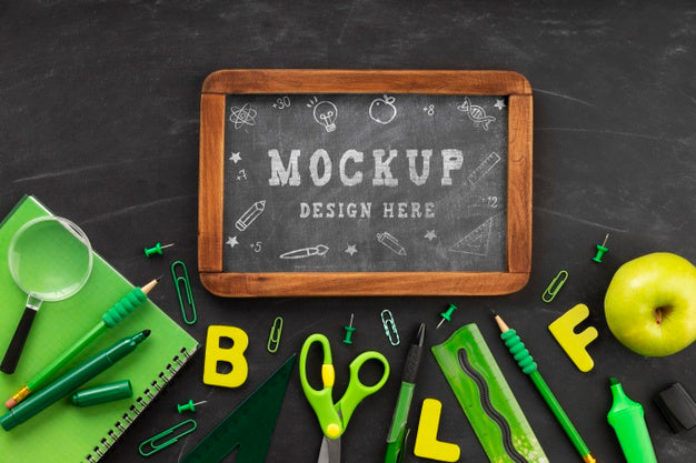 Top View Of Chalkboard With School Essentials For Education Day Psd