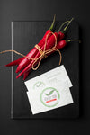 Top View Of Chili Peppers And Menu Psd