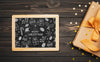 Top View Of Christmas Concept Chalkboard On Wooden Table Psd