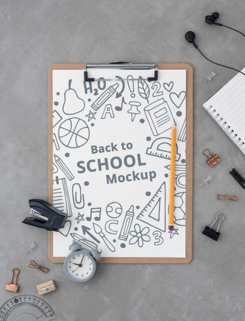 Top View Of Clip Pad With School Supplies Psd