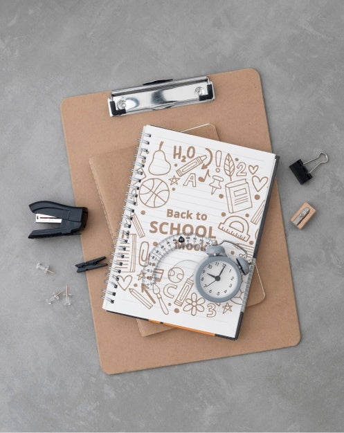 Top View Of Clip Pad With School Supplies Psd