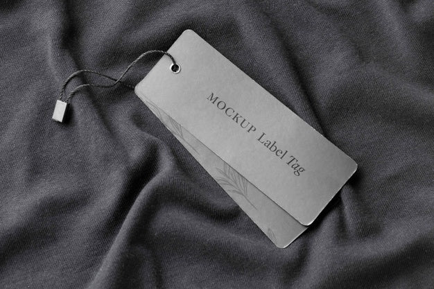 Top View Of Clothing Label On Black Fabric Psd