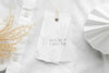 Top View Of Clothing Label On White Shirt Fabric Psd