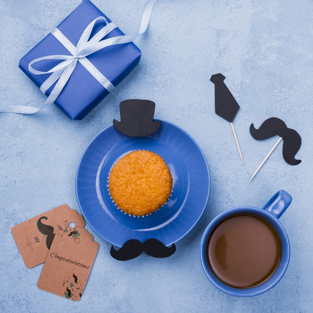Top View Of Cupcake On Plate With Coffee And Gift For Fathers Day Psd