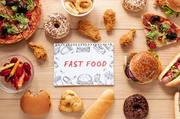 Top View Of Delicious Fast Food On Wooden Table Psd