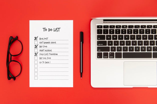 Top View Of Desk Surface With Laptop And To Do List Psd