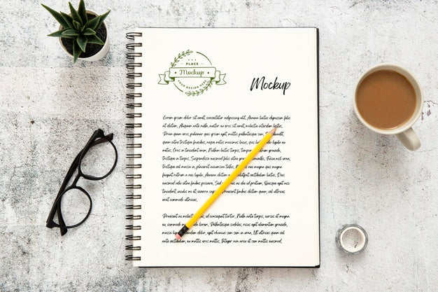 Top View Of Desk Surface With Notebook And Coffee Psd