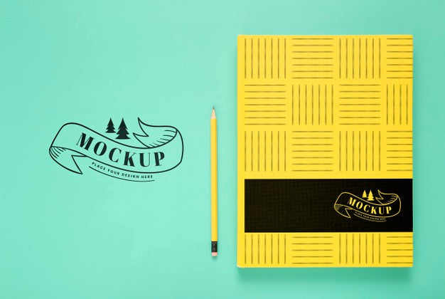 Top View Of Desk Surface With Notebook And Pencil Psd