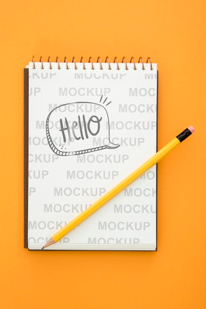 Top View Of Desk Surface With Pencil And Notebook Psd