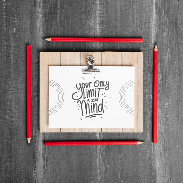 Top View Of Desk Surface With Pencils And Card Psd