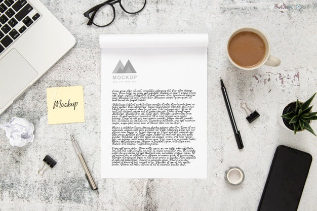 Top View Of Desk Surface With Smartphone And Laptop Psd