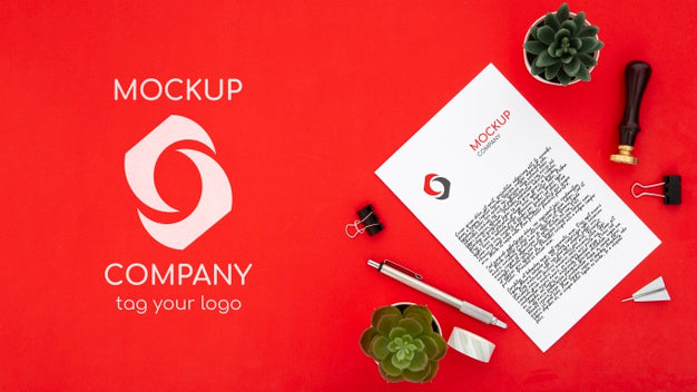 Top View Of Desk Surface With Succulents And Document Psd