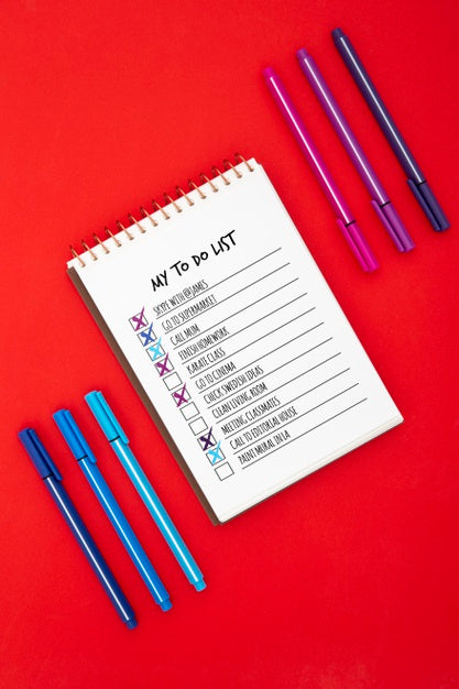 Top View Of Desk Surface With To Do List And Pens Psd