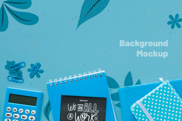 Top View Of Desk With Calculator And Notebooks Psd