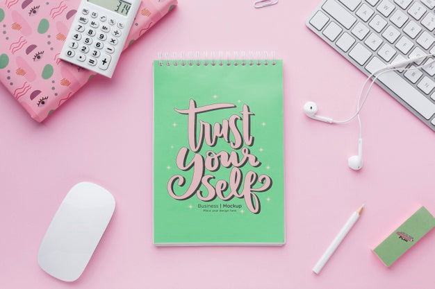 Top View Of Desk With Notebook And Earphones Psd