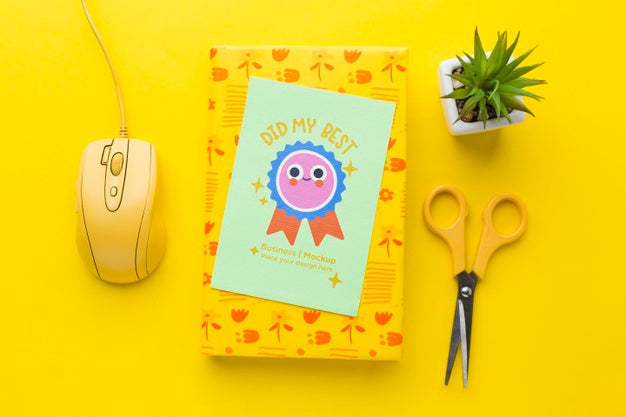 Top View Of Desk With Notebook And Scissors Psd