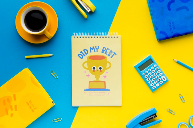 Top View Of Desk With Notebook And Stapler Psd