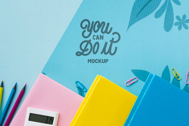 Top View Of Desk With Notebooks And Pencils Psd