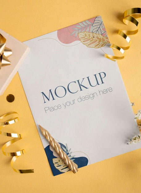 Top View Of Elegant Birthday Card With Ribbon And Candle Psd