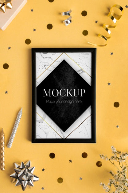 Top View Of Elegant Birthday Frame With Candle And Gift Psd