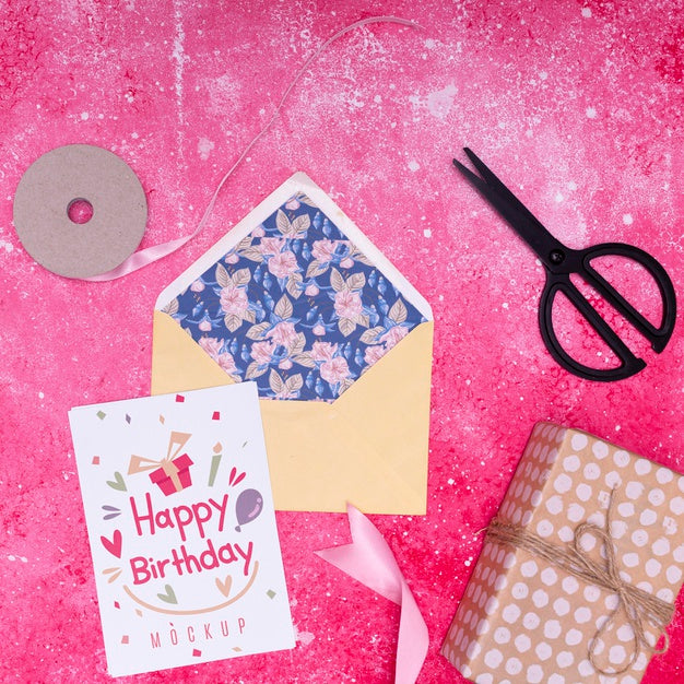 Top View Of Envelope With Gift And Ribbon Psd