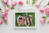 Top View Of Family Frame And Flowers On Wooden Background Psd