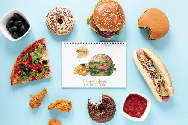 Top View Of Fast Fost And Notebook Mock-Up Psd