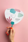 Top View Of Female Hands Holding Mock-Up Paper Fan Psd
