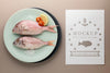 Top View Of Fish On Plate With Salt And Tomatoes Psd