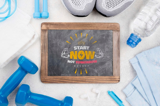 Top View Of Fitness Blackboard With Weights And Sneakers Psd