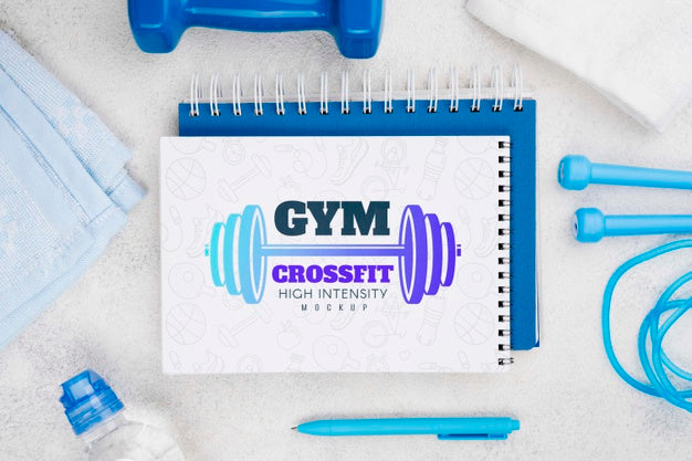 Top View Of Fitness Notebook With Jumping Rope And Pen Psd