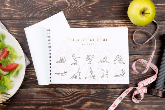 Top View Of Fitness Notebook With Plate Of Salad And Apple Psd