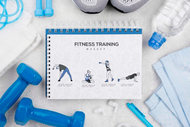 Top View Of Fitness Notebook With Sneakers And Weights Psd