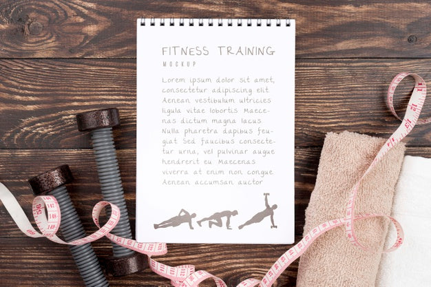 Top View Of Fitness Notebook With Weights And Measuring Tape Psd