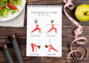 Top View Of Fitness Notebook With Weights And Measuring Tape Psd