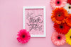 Top View Of Frame And Flowers With Pink Background Psd