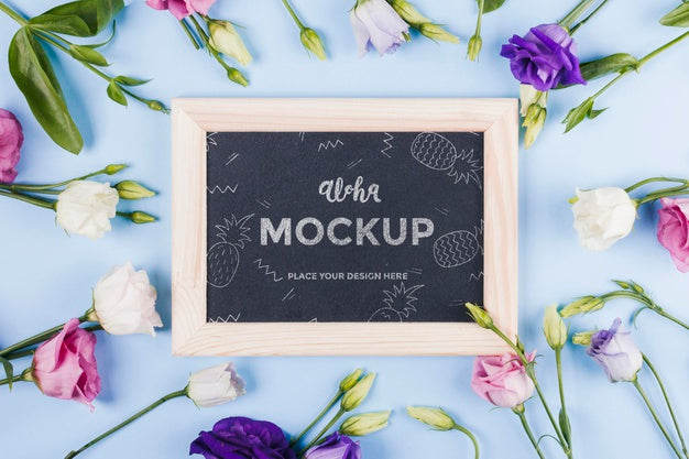 Top View Of Frame Mock-Up With Assortment Of Flowers Psd