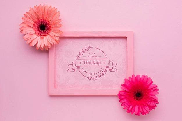 Top View Of Frame Mock-Up With Daisies Psd