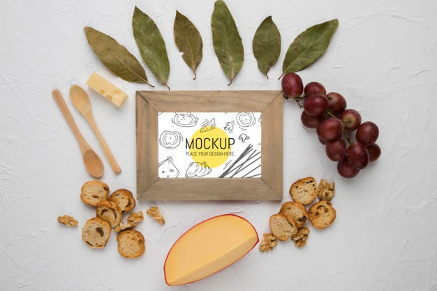 Top View Of Frame With Cheese And Grapes Psd