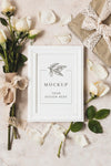 Top View Of Gift Mock-Up With Bouquet Of Roses Psd