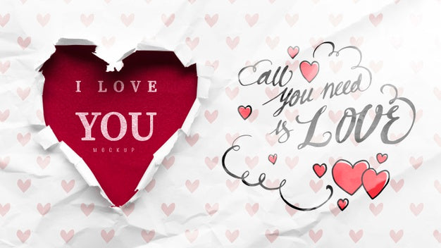 Top View Of Heart-Shaped Rip In Paper With Message Psd